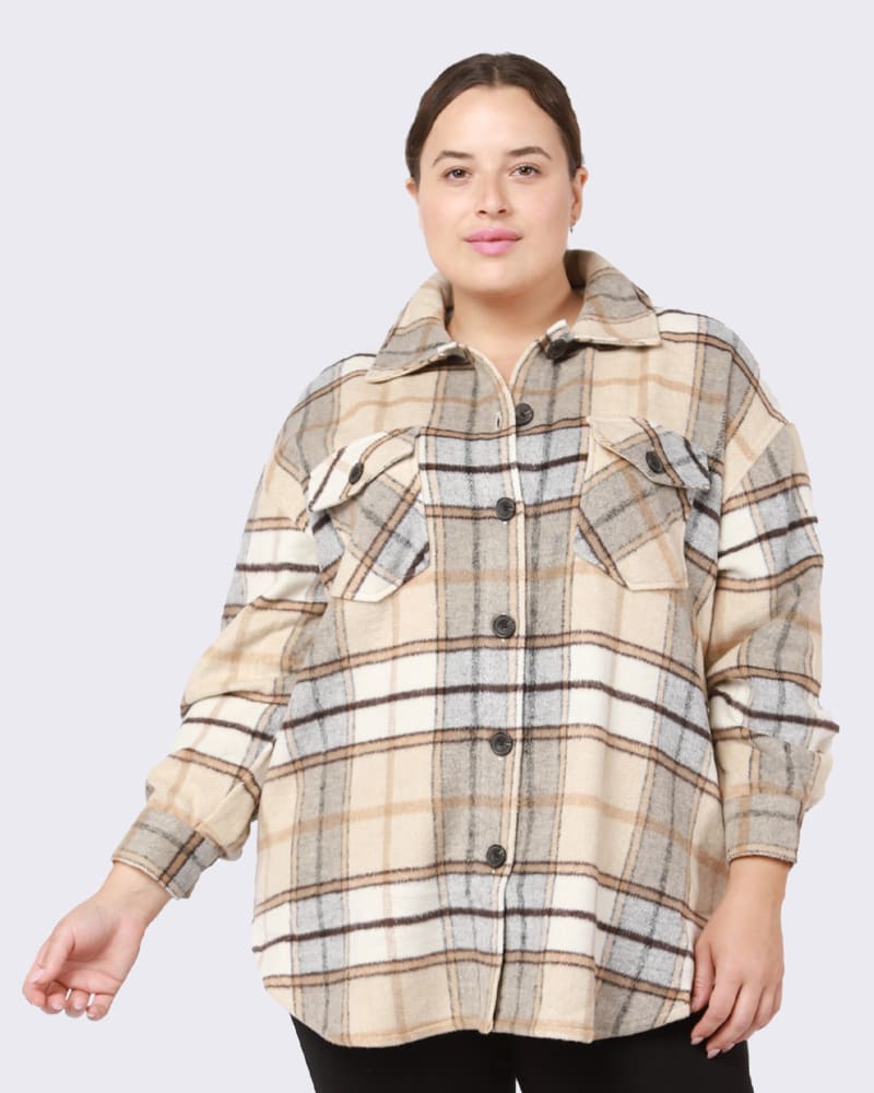 Front of a model wearing a size 0X Brylee Plaid Snap Front Shacket in Tan / Black by DEX PLUS. | dia_product_style_image_id:235520